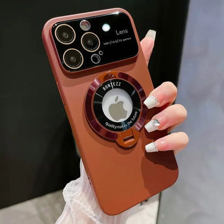 a woman holding an iphone case with a camera