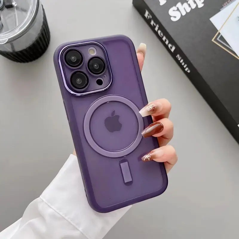 a woman holding a purple iphone case