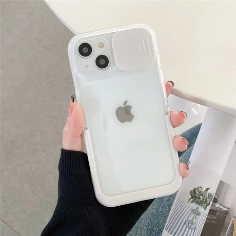 a woman holding an iphone case with a white background