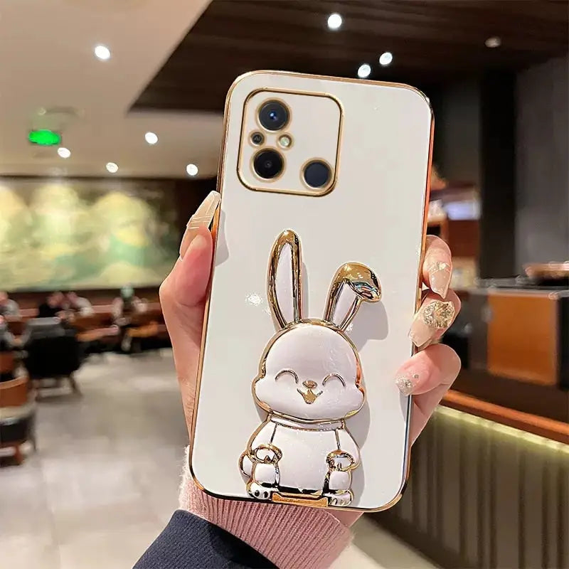 a person holding a phone case with a rabbit on it