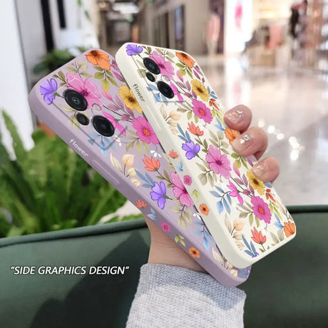 a woman holding a phone case with flowers on it