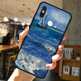 someone holding a phone case with a painting of a boat in the ocean