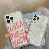 a woman holding a phone case with the words wish you