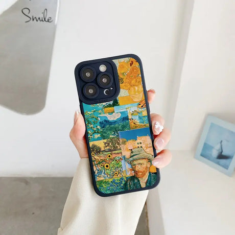 a woman holding a phone case with a painting on it