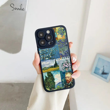 a woman holding a phone case with a painting on it