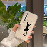 a woman holding up a phone case with a black cat on it
