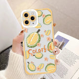 a woman holding a phone case with a lemon pattern