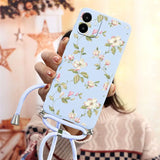 a woman holding a phone case with a floral pattern