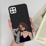 a woman holding a phone case with a picture of herself