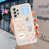 a woman holding a phone case with stickers on it