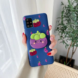 a woman holding a phone case with a cartoon character on it