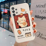 a woman holding a phone case with a cartoon cat