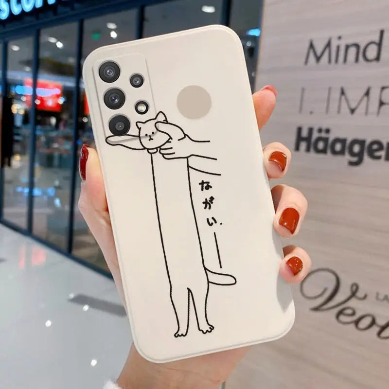 a woman holding a phone case with a drawing of a man