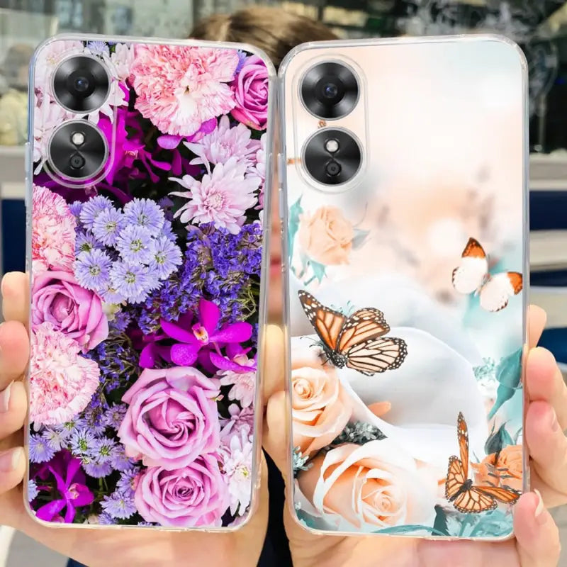 a woman holding a phone case with flowers and butterflies