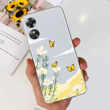 a woman holding a phone case with a yellow butterfly on it