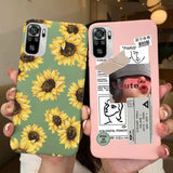 a woman holding up a phone case with a sunflower pattern