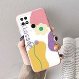 a woman holding a phone case with a flower on it