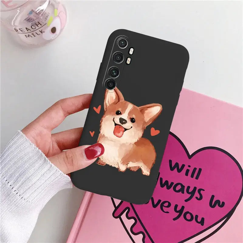 a close up of a person holding a phone case with a dog on it