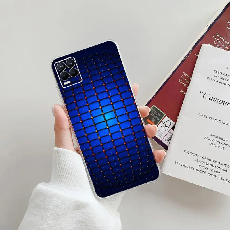 a person holding a phone case with a blue and red pattern