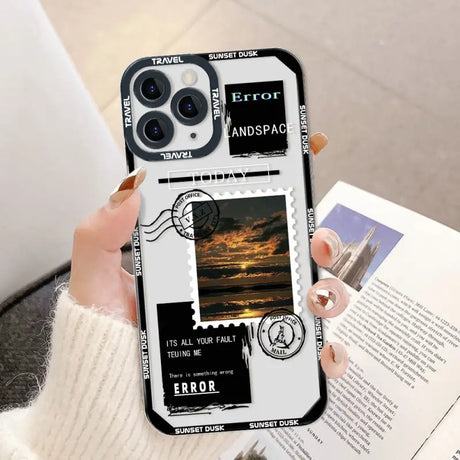 a woman holding a phone case with a photo of a sunset