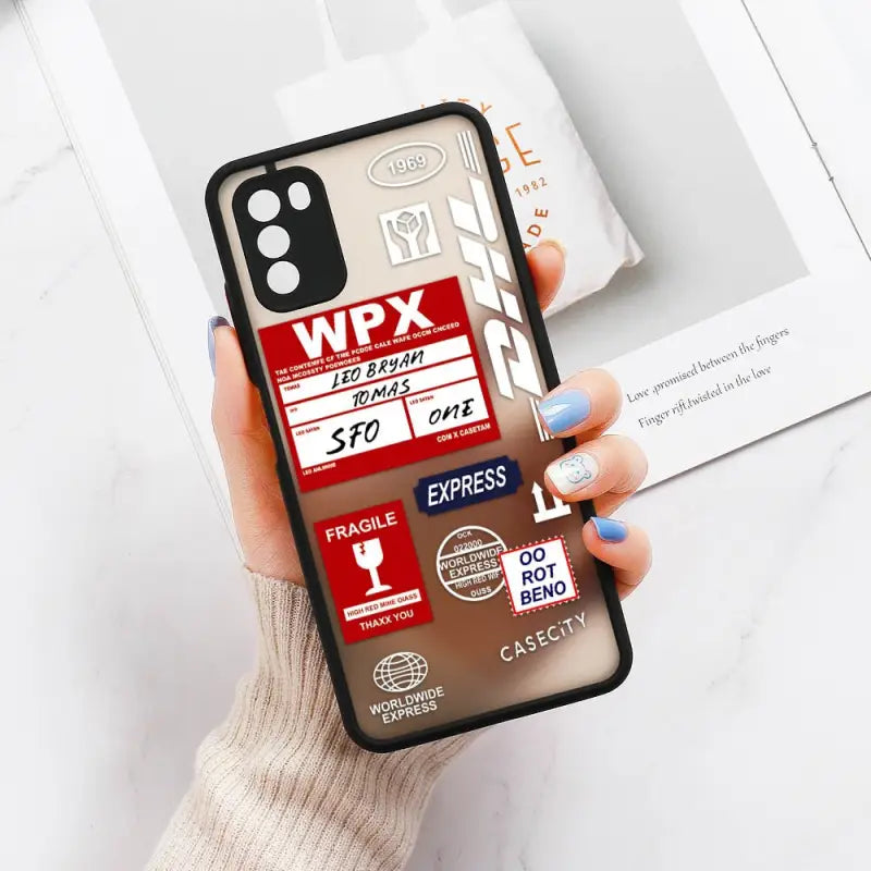 a woman holding a phone case with the words vfx on it