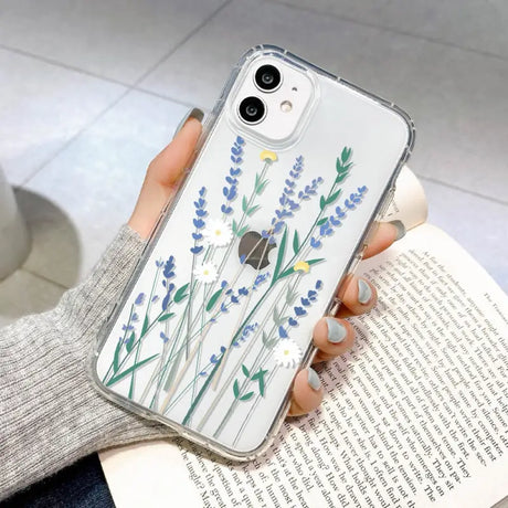 a woman holding a phone case with lavender flowers