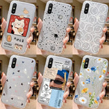 a close up of a person holding a cell phone with a bunch of different designs