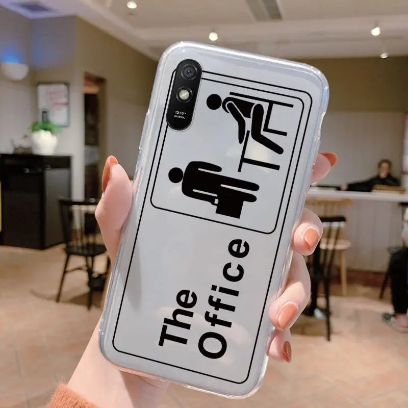 a woman holding up a phone case with the words life