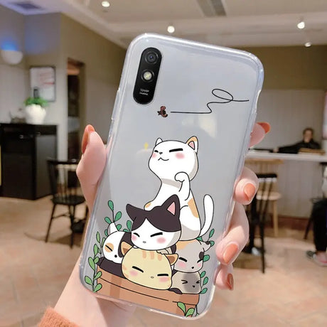 a woman holding a phone case with a cat and dog on it