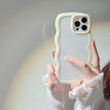 a woman holding a phone case with a white background