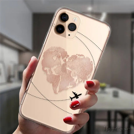 a woman holding a phone case with a world map on it