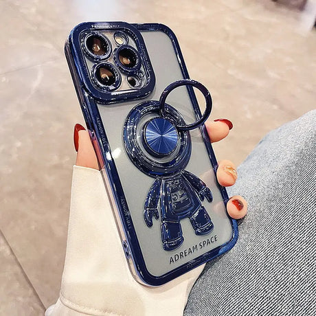 a woman holding a phone case with a blue phone