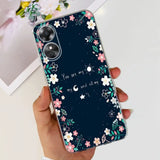 a woman holding a phone case with flowers and stars