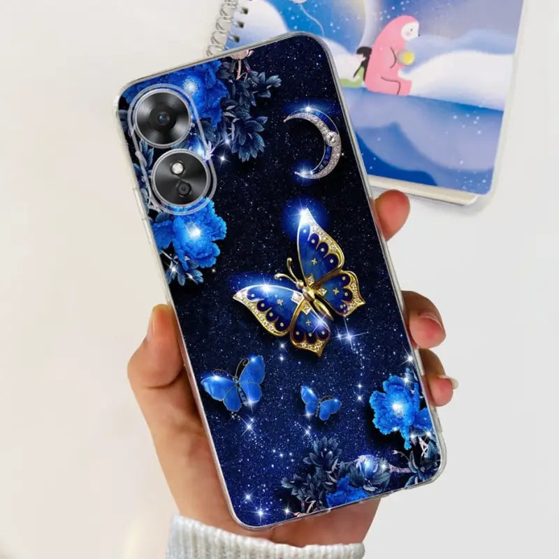 a woman holding a phone case with a blue butterfly design