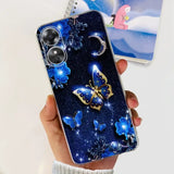 a woman holding a phone case with a blue butterfly design