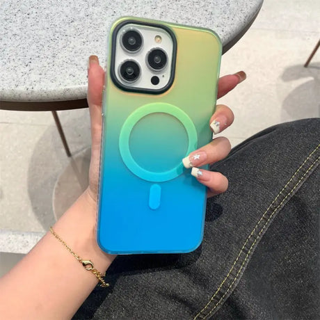 a woman holding a phone case with a phone holder