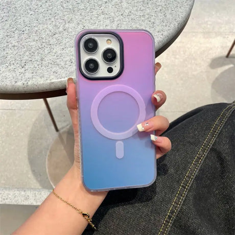 a woman holding a phone case with a purple and blue gradient color