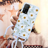 a woman holding a phone case with flowers on it