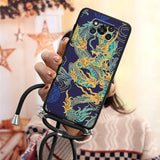 a woman holding up a phone case with a dragon design