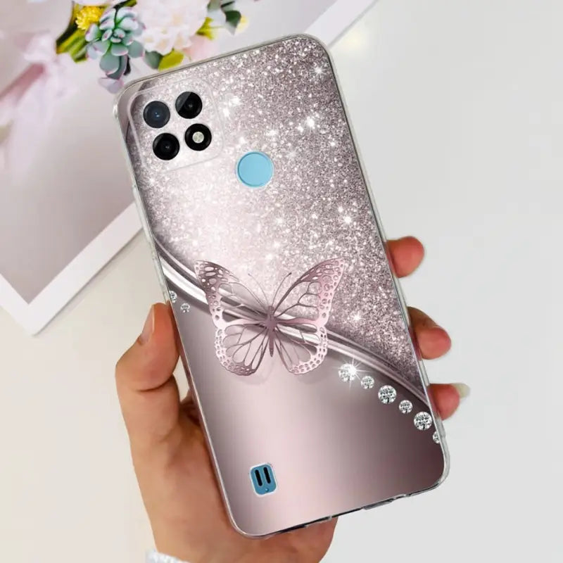 a hand holding a phone case with a bow