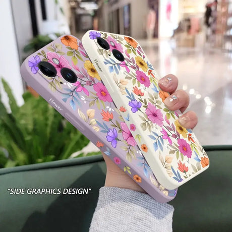 a woman holding a phone case with flowers on it