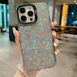 a woman holding a phone case with a blue and green pattern