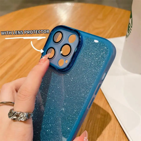 a woman holding a phone case with glitter on it