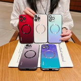 a woman holding three iphones with a ring on them