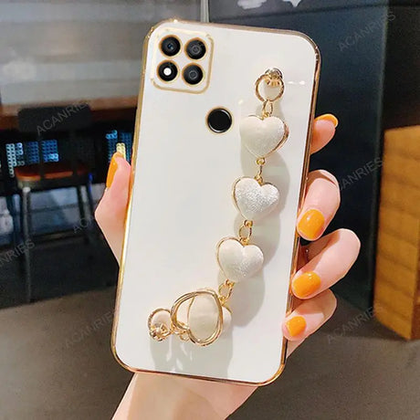 a woman holding a phone case with a ring on it