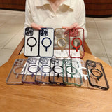a woman holding a phone case with various rings