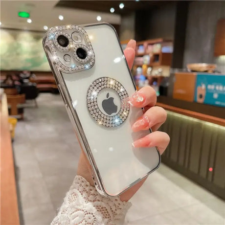 a woman holding a phone case with a diamond ring