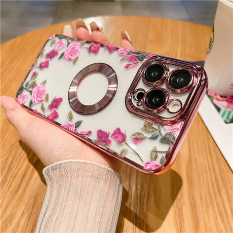 a woman holding a phone case with a flower pattern