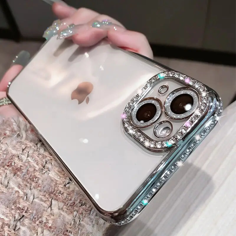 a woman holding a phone case with a diamond ring