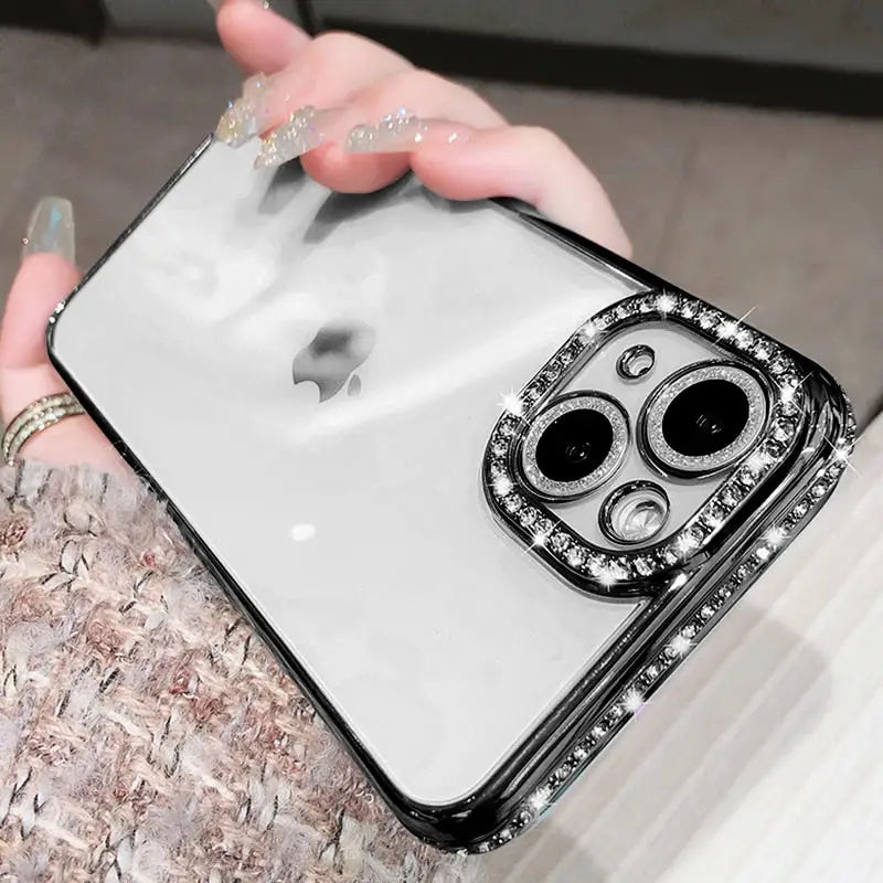 a woman holding a phone case with a skull face on it